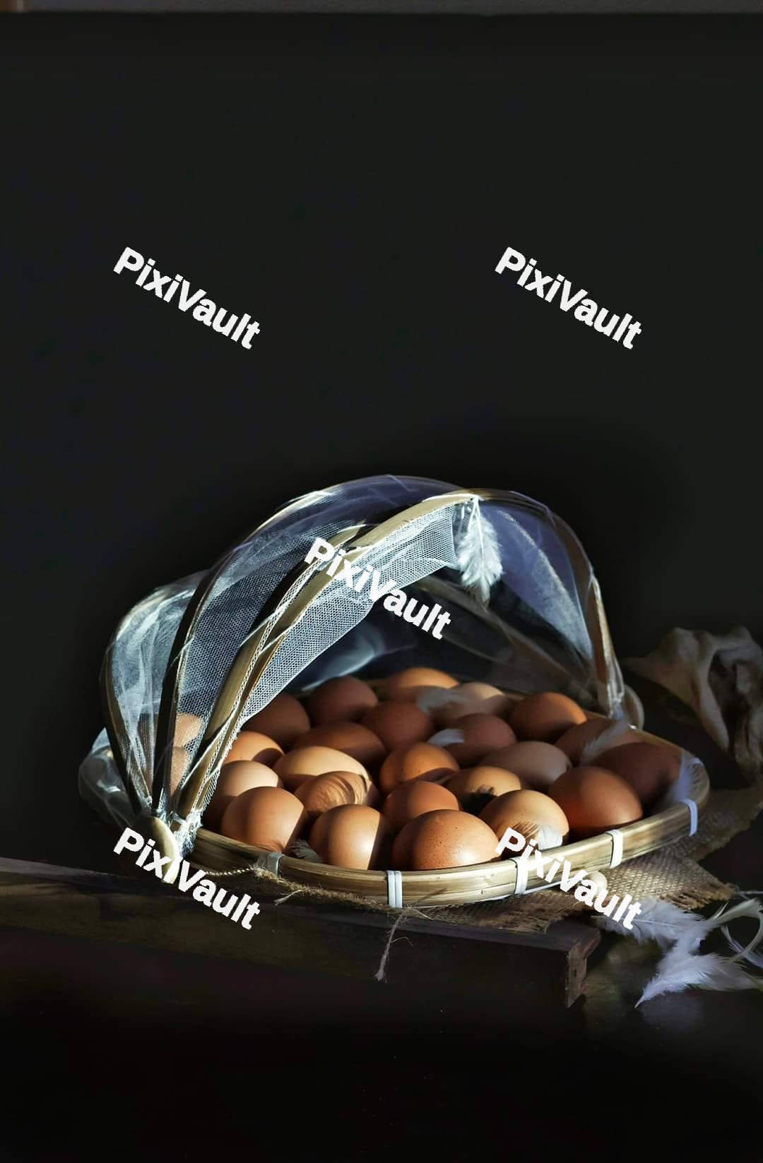 A table with a basket of eggs